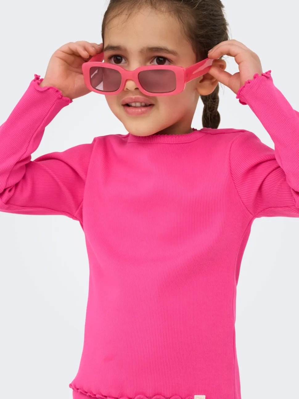 KMGTRINNY Top