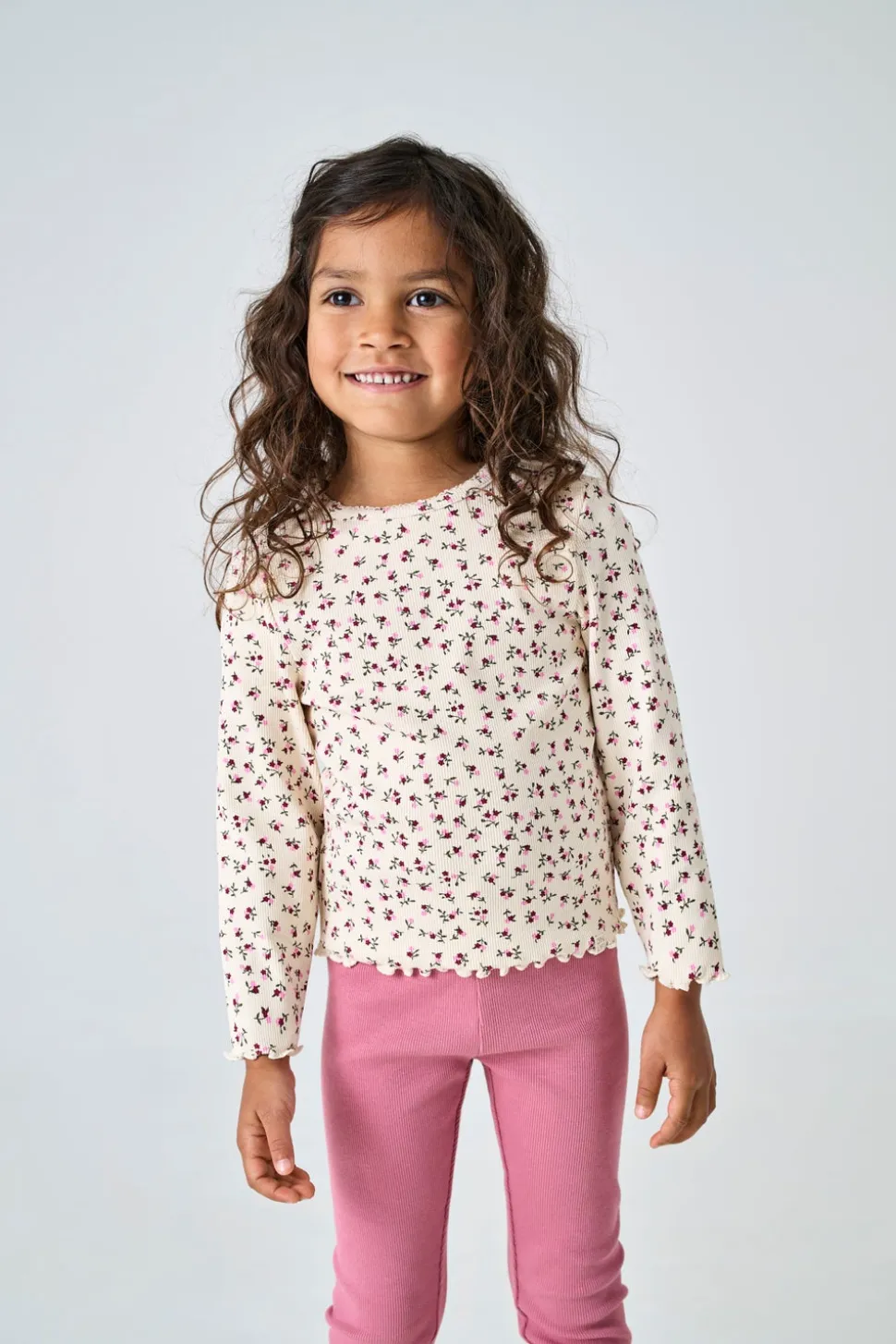 KMGTRINNY Top